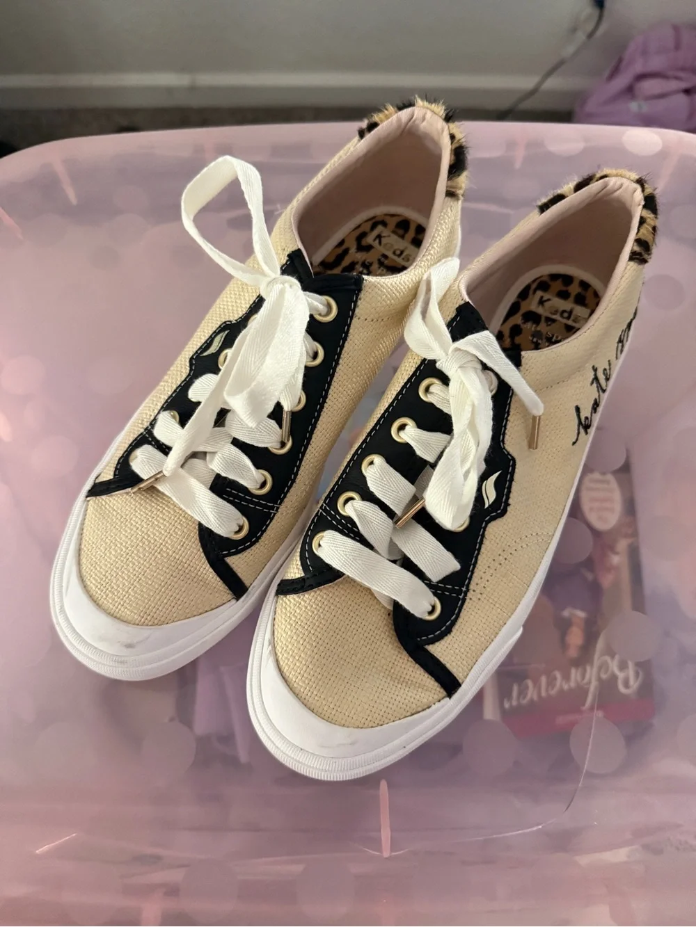 kate spade Cream Canvas Sneakers with Black Trim and Leopard Accent